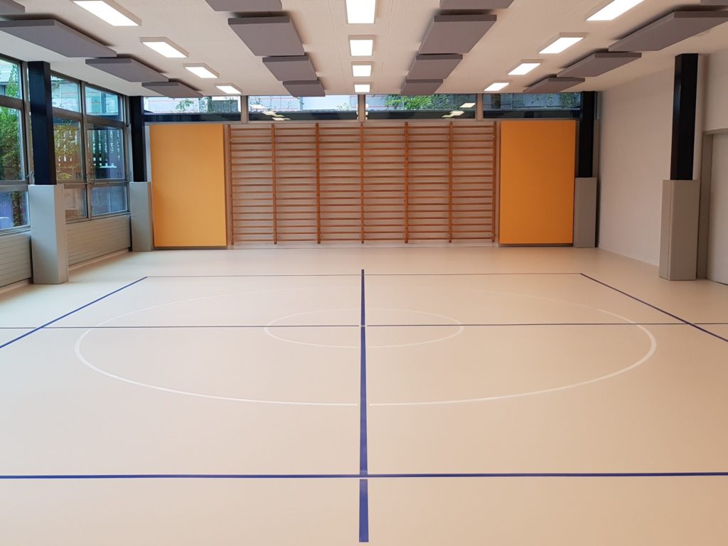 Salle de rythmique rénovée avec un sol sportif en résine polyuréthane